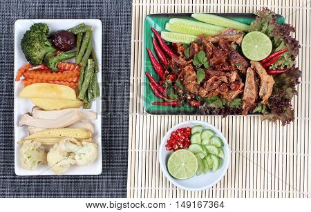 Spicy and  sour mixed herb salad with fried stir taro in tofu sheet and fried  mixed vegetables served with side dish are food for Vegetable festival of Chinese  as "J food festival" and good life.