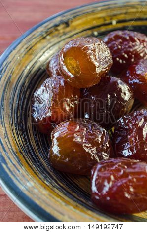 sweet dried pitted dates on a plate