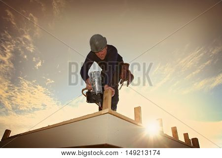 A carpenter working on a consruction site