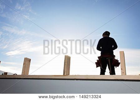 A carpenter working on a consruction site