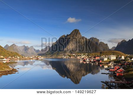 Village of Reine with mountain reflection Lofoten Norway