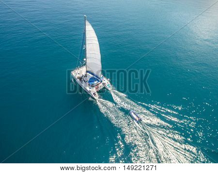 Aerial view of sailing boats walking on the sea in Koh Phangan, Thailand