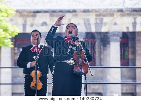 GUADALAJARA MEXICO - AUG 28 : Mariachis perform on stage at the 23rd International Mariachi & Charros festival in Guadalajara Mexico on August 28 2016.