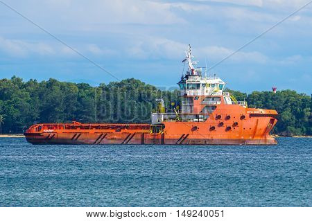 Labuan,Malaysia-Sept 26,2016:View of a typical supply boat or vesse at Labuan sea.Labuan strategically located in the hub of Asia-Pacific and the ASEAN offshore oil exploration and production region.