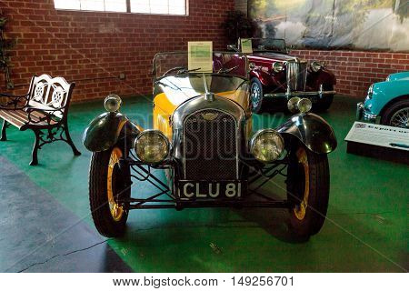El Segundo, CA, USA - September 26, 2016: Bright yellow 1935 Morgan displayed at the Automobile Driving Museum in El Segundo, California, United States. Editorial use only.
