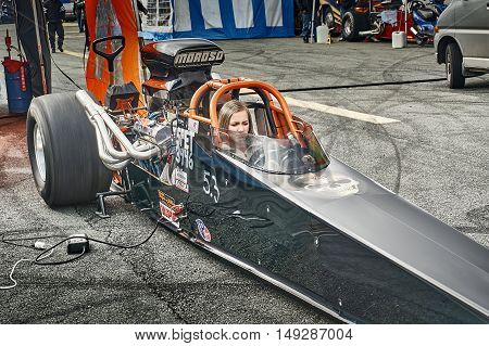 Norway Drag Racing, Driver In A Black Race Car Front View