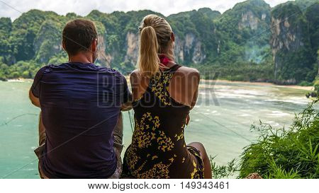 A Couple on View Point t Hat Tom Sai Beach at Railay near Ao Nang, Krabi, Thailand.