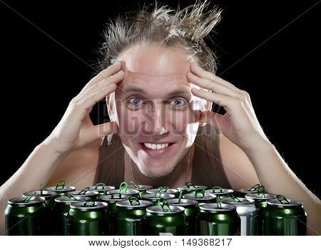 The happy tipsy man near empty beer jars