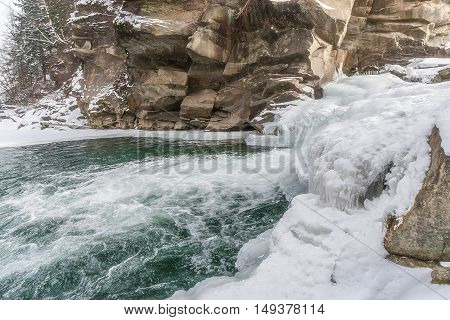 Winter Waterfalls in the Carpathian Mountains on the river Prut. Yaremcha Ukraine.