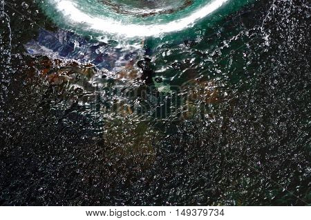 Textured close up of water spray from fountain