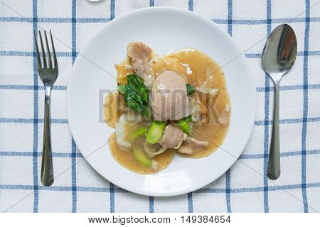 Rad Na, Famous Thai Chinese Style Wide Rice Noodle Dish With Tasty Tender Pork With Thick Gravy Sauc