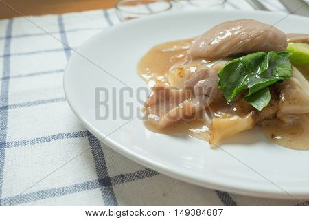 Rad Na, Famous Thai Chinese Style Wide Rice Noodle Dish With Tasty Tender Pork With Thick Gravy Sauc
