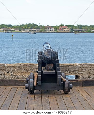 Old cannons in a fort, on an overcast day. Old Castillo de San Marcos, St. Augustine, Florida