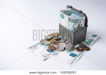 Iron chest with coins and small denomination