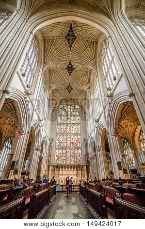 Bath UK - August 15 2015: Interior view of Bath Abbey. Symmetrical low angle view. The abbey is an Anglican parish church and an active place of worship
