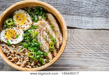 Bowl Of Chicken Ramen Soup On The Wooden Table