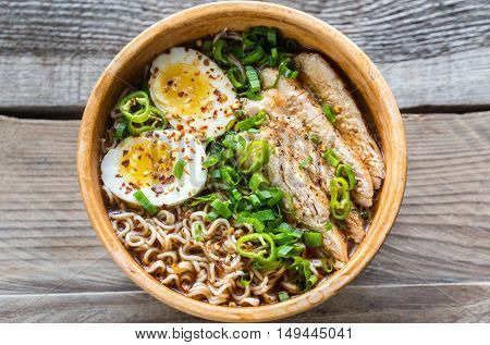 Bowl Of Chicken Ramen Soup On The Wooden Table