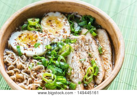 Bowl Of Chicken Ramen Soup On The Wooden Table