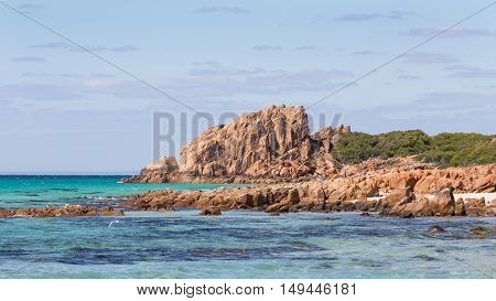 Castle Rock near Dunsborough in Western Australia is a massive chunk of orange granite standing tall at the end of beautiful Castle Bay.