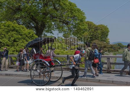 KYOTO, JAPAN - APRIL 30 , 2016: rickshaw  in Arashiyama, Kyoto, Japan. Arashiyama  , Scenic Beauty and Historic  Site. soft focus .  Kyoto, Japan. APRIL 29 2016.