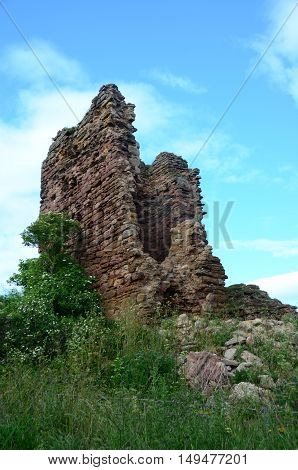 A view of the ruins of an old coastal tower at Seafield beach