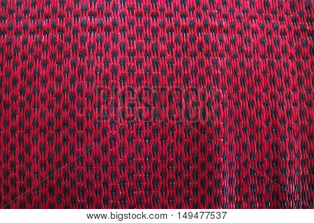 mat Thai style weaving dyeing and woven into a fabric.