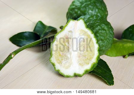 Bergamot Fruit With Leaf On Wooden Board