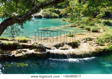 Beautiful turquoise pools and limestone bridges surrounded by the jungle in Semuc Champey in Alta Verapaz region Guatemala