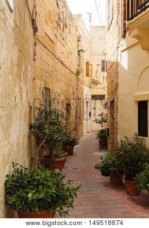 Traditional narrow street in Malta. Maltese architecture in Valletta, Malta