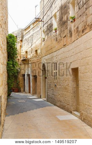 Traditional narrow street in Malta. Maltese architecture in Valletta, Malta