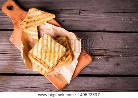 Crispy and hot sandwiches with cheese, grilled
