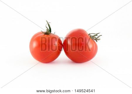 Fresh ripe tomatoes isolated on white background