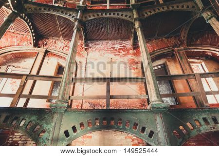 iron circular staircase in Fort Alexander Chumnoy in the Gulf of Finland