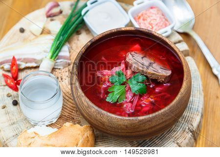 Traditional Ukrainian Russian Vegetable Soup, Borsch With Garlic Donuts, Pampushki On A White Wooden