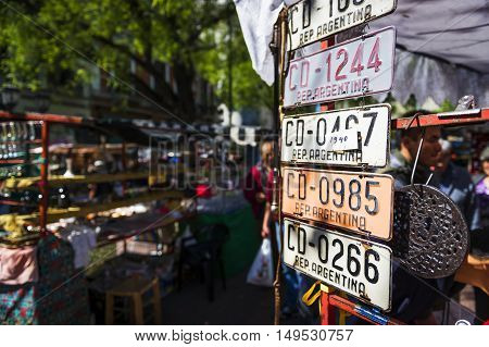 Buenos Aires Argentina - October 6 2013: People in the San Telmo street market in the San Telmo neighborhood in the city of Buenos Aires in Argentina