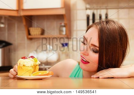 Woman Eating Delicious Sweet Cake. Gluttony.