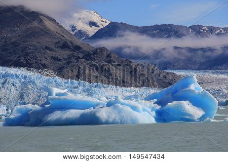 Blue iceberg and clouds in El Calafate Patagonia Argentina