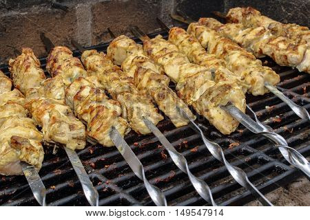 a Shashlik on skewers closeup on grill