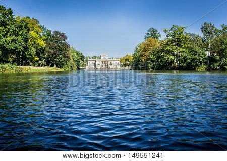 WARSAW, POLAND - SEPTEMBER 27: View of the Lazienki Palace, the Palace on the Water in Lazienki Park or Royal Baths Park in Warsaw, Poland on September 27, 2016