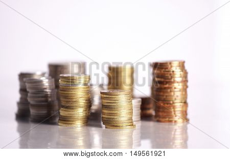Coins stacked up  isolated on white background