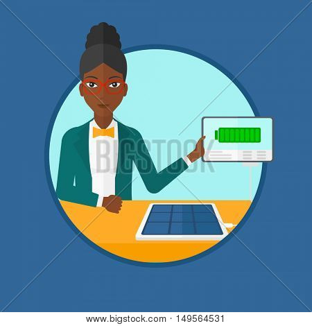 An african-american young smiling woman charging tablet computer with solar panel. Charging tablet from portable solar panel. Vector flat design illustration in the circle isolated on background.