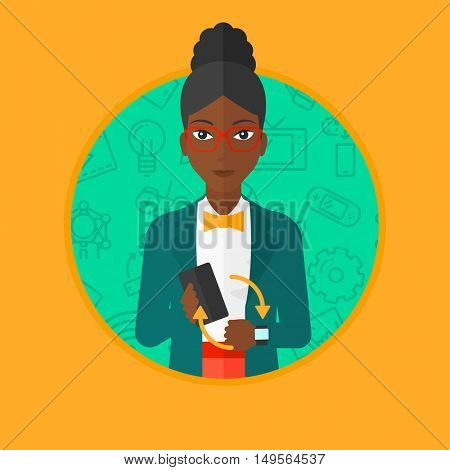 An african woman holding a smartphone and wearing on wrist her smart watch. Synchronization between smart watch and smart phone. Vector flat design illustration in the circle isolated on background.