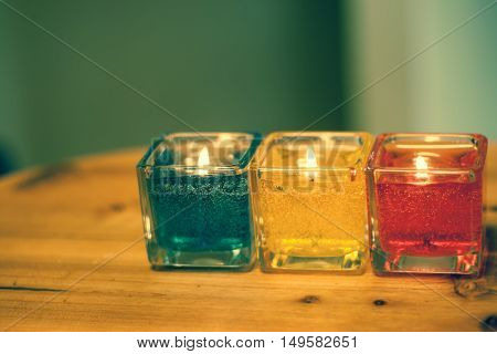 red yellow orange white  blue candle .