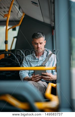 Businessman Traveling By Bus