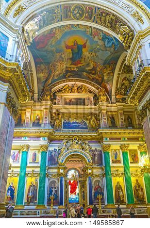 SAINT PETERSBURG RUSSIA - APRIL 25 2015: The St Isaac's Cathedral is one of the most famous landmarks in city with unique interior full of masterpieces of art on April 25 in Saint Petersburg.