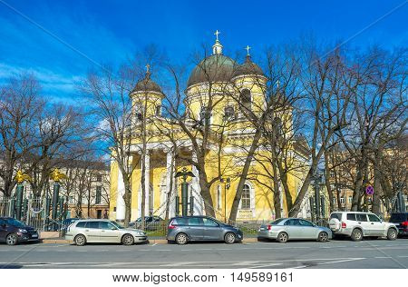 The facade of the Transfiguration Cathedral with massive portico tall columns and four bell towers located in the same named square in St Petersburg Russia.