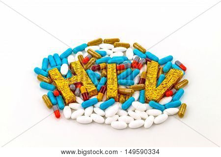 A word HIV on pill lie strewn background