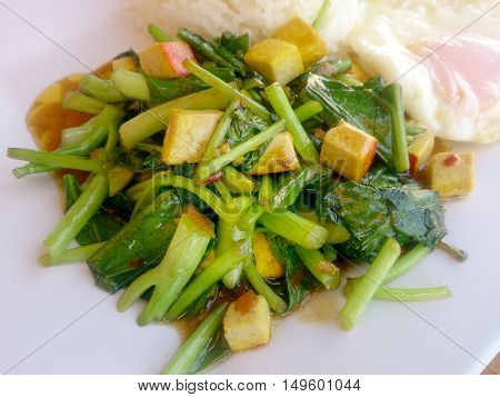 Stir Fried Chinese Kale With Tofu In White Plate.. Vegetarian Food, Healthy Food.