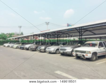blur image of car park in outdoor parking