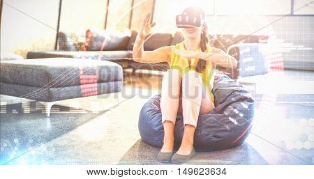 Composite image of face against woman wearing virtual reality simulator Woman wearing virtual reality simulator while gesturing at home